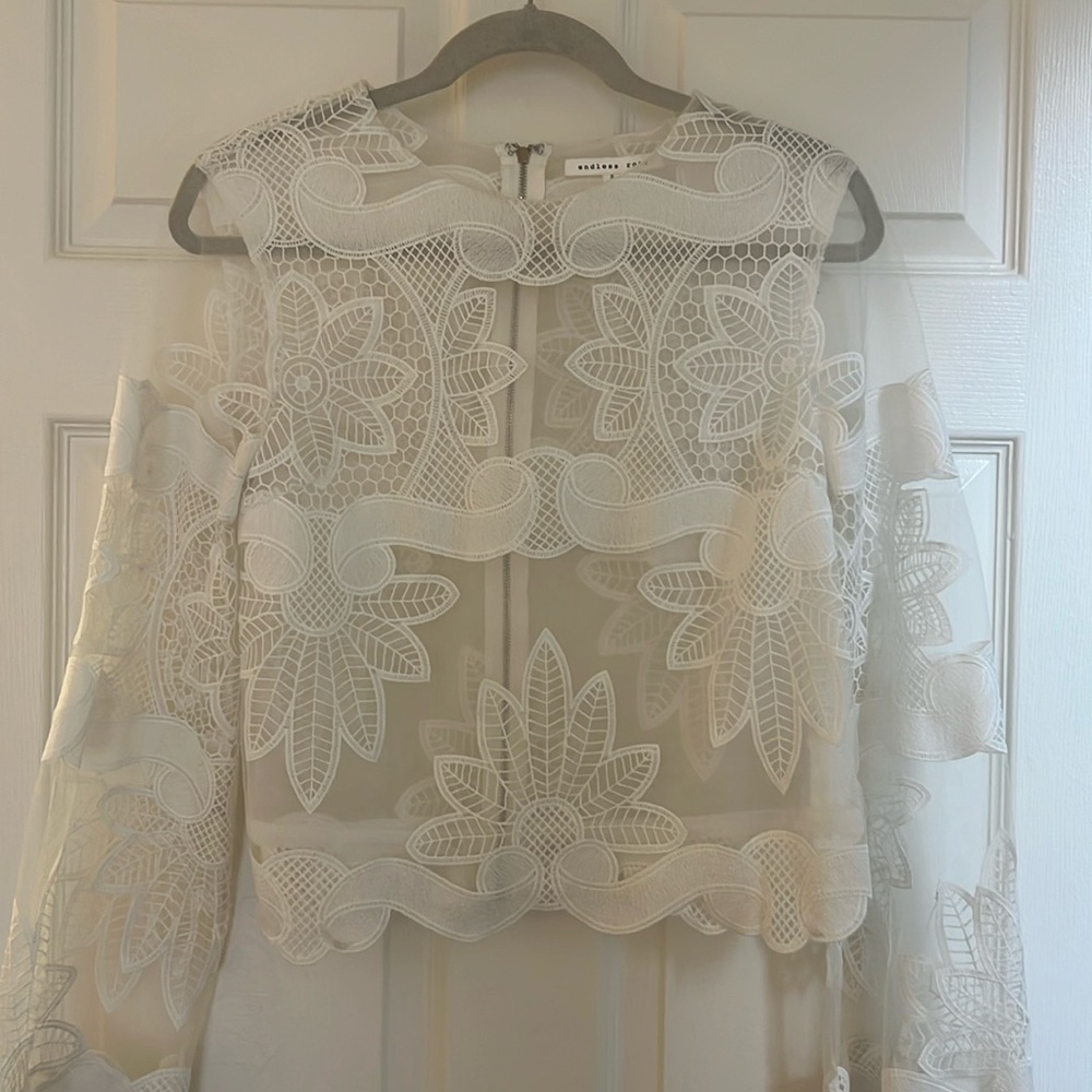 White long sleeve top